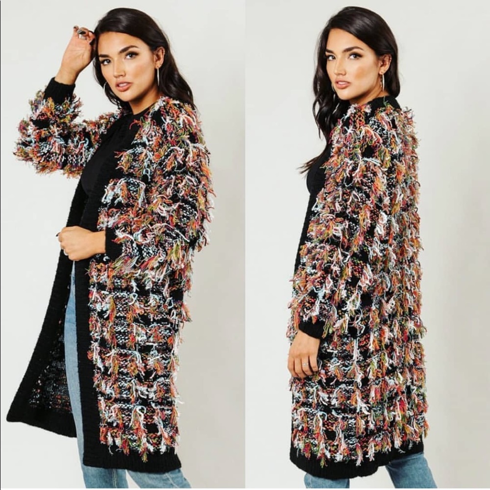 Multi color shaggy sweater. Brand new. Never worn.